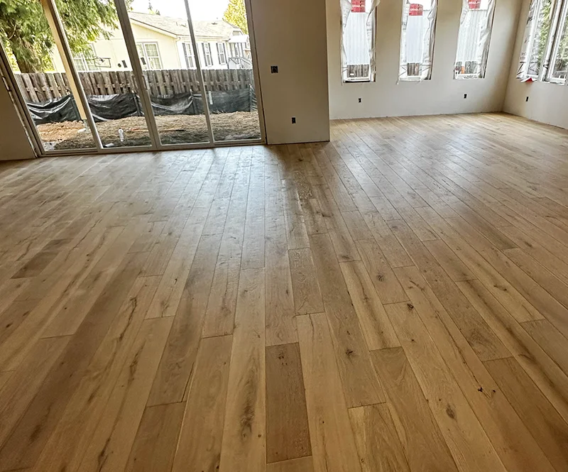 Honey Colored Wood Floor In A Newly Built Home 800x665